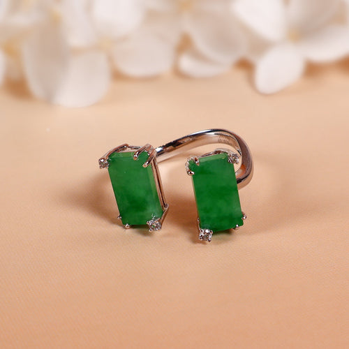 A semi-open jade ring inlaid with two jades and diamonds